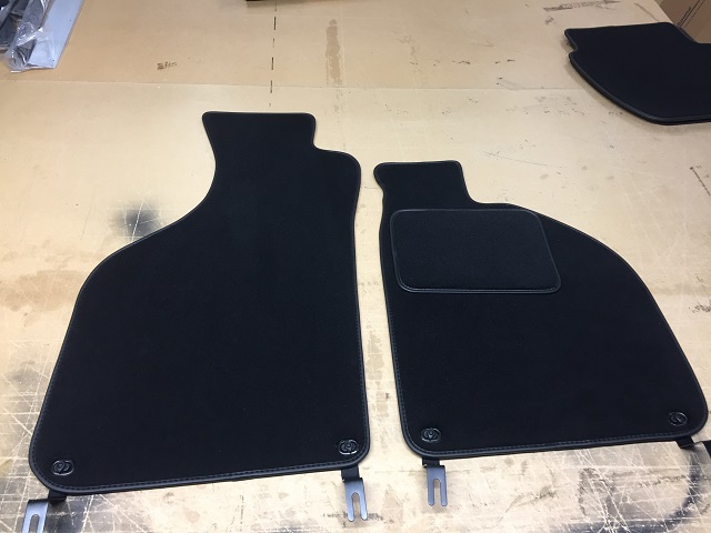 picture of Carpet over mats with OEM fittings